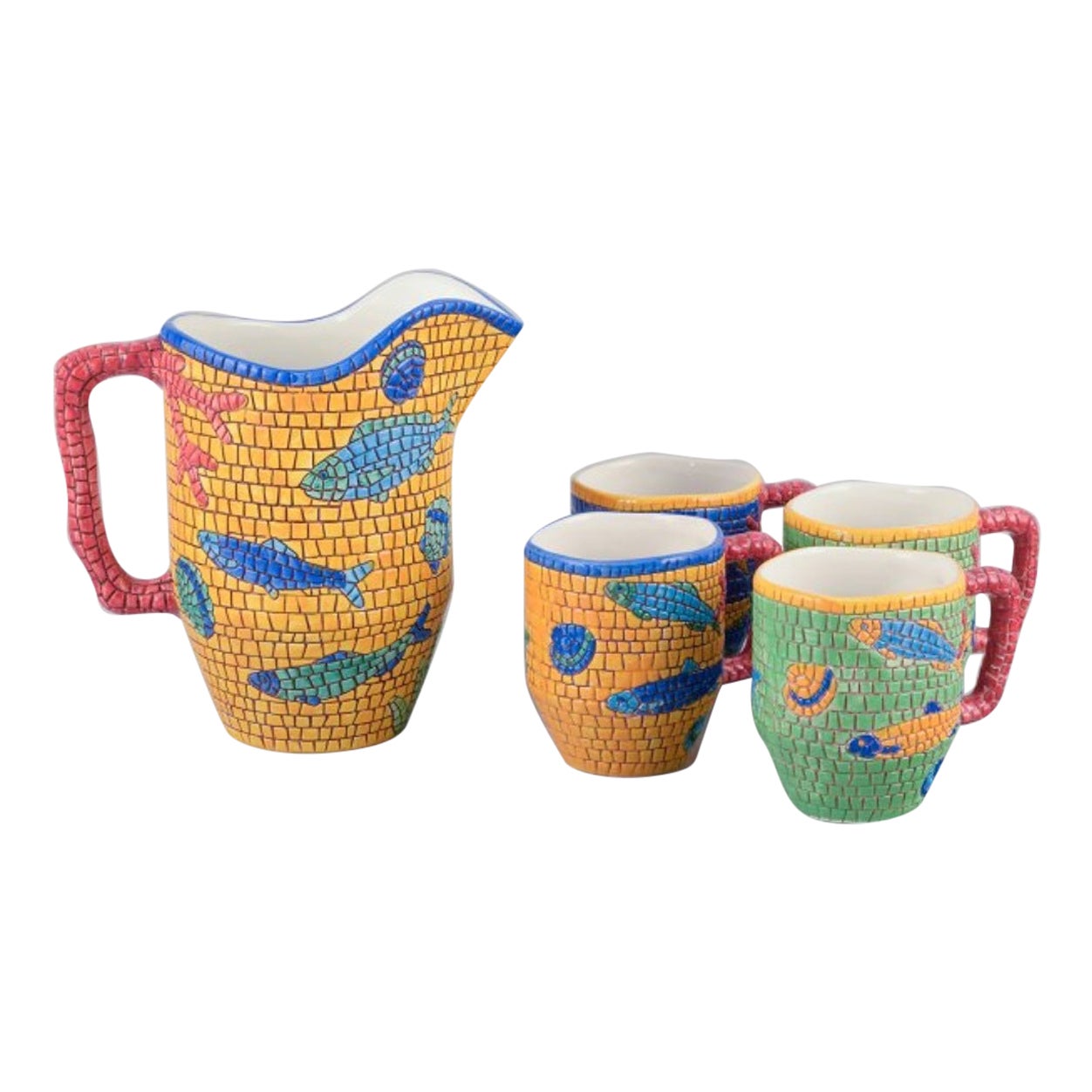 Vietri, Italy. Set of four large mugs and a large pitcher in ceramic. 