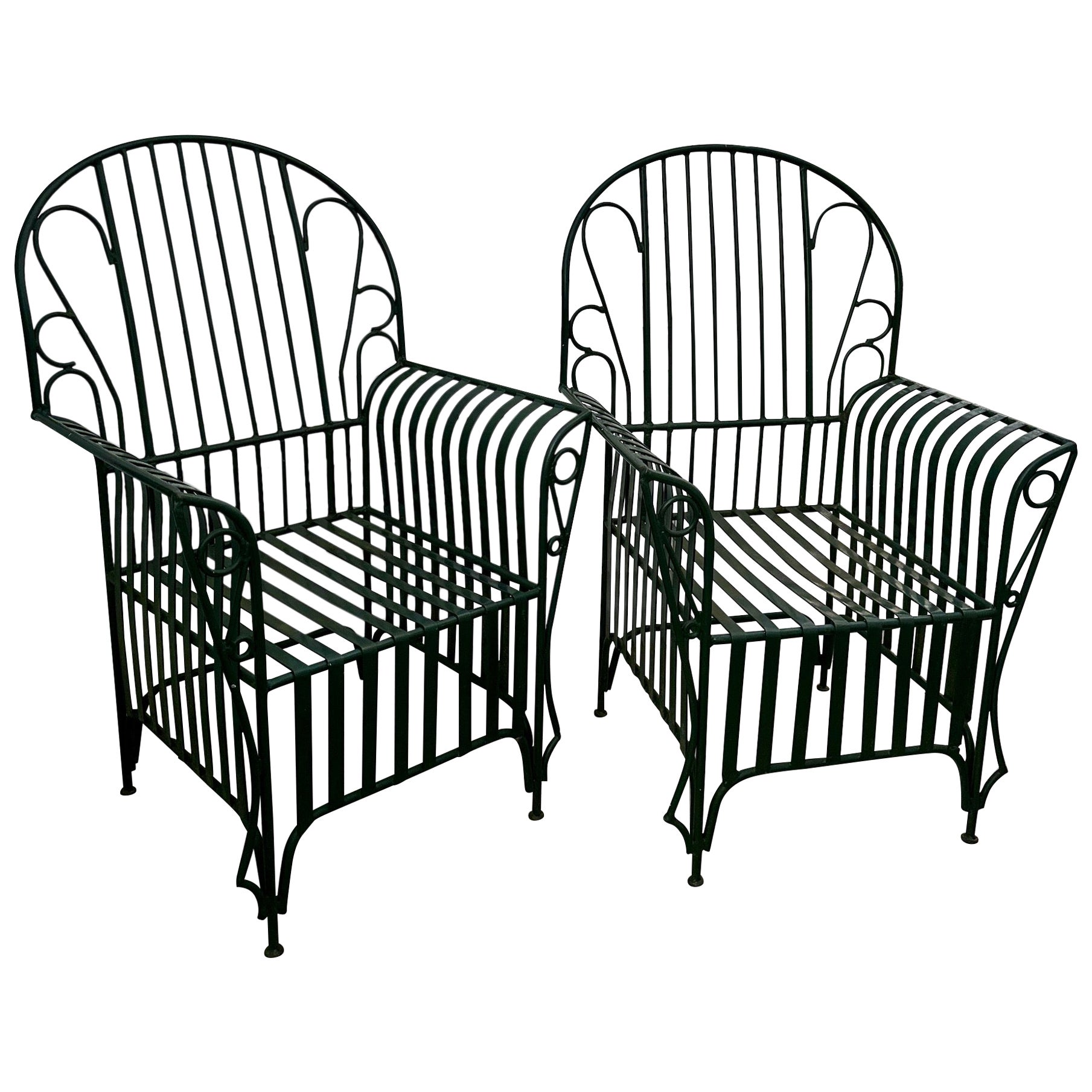 A Mid Century  Pair of Oversized Wrought Iron Patio Chairs