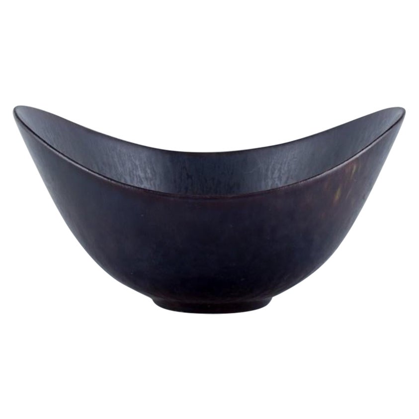 Gunnar Nylund for Rörstrand. Ceramic bowl with glaze in blue and brown tones. For Sale