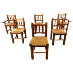 Vintage oak and wicker dining chairs, 1960s