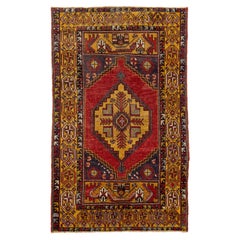 Anatolischer Vintage-Wollteppich mit geometrischem Motiv in mehrfarbigem Muster