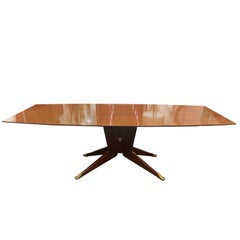 A large cherrywood dining table by Melchiorre Bega