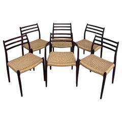 Set of Six Danish Modern Rosewood and Papercord Dining Chairs by Niels Moller