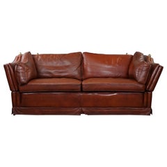 Vintage 2-seater castle bench made of high-quality cognac-colored cowhide leather