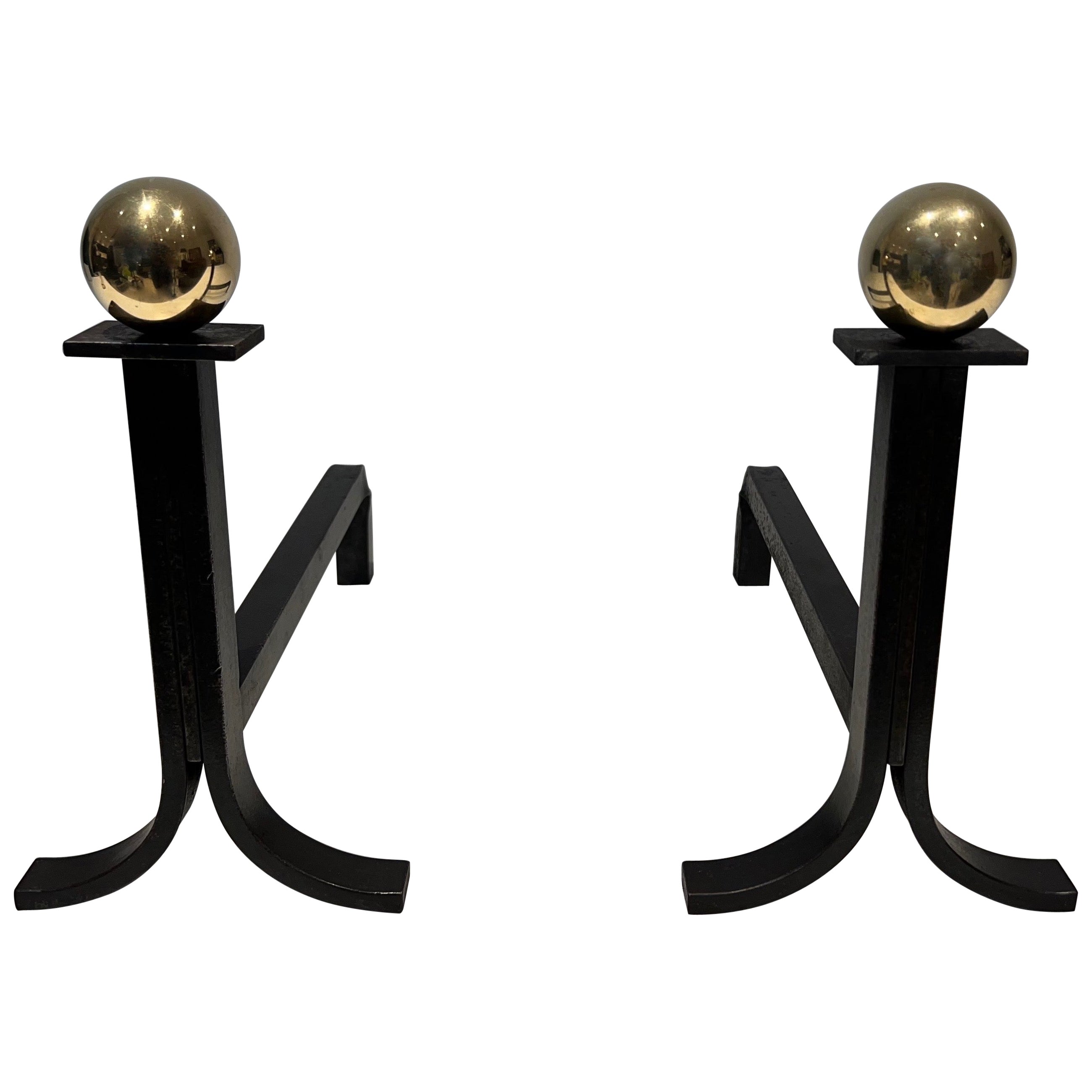 Pair of Modernist Cast Iron, Brass and Wrought Iron Andirons in the Style of Jac For Sale