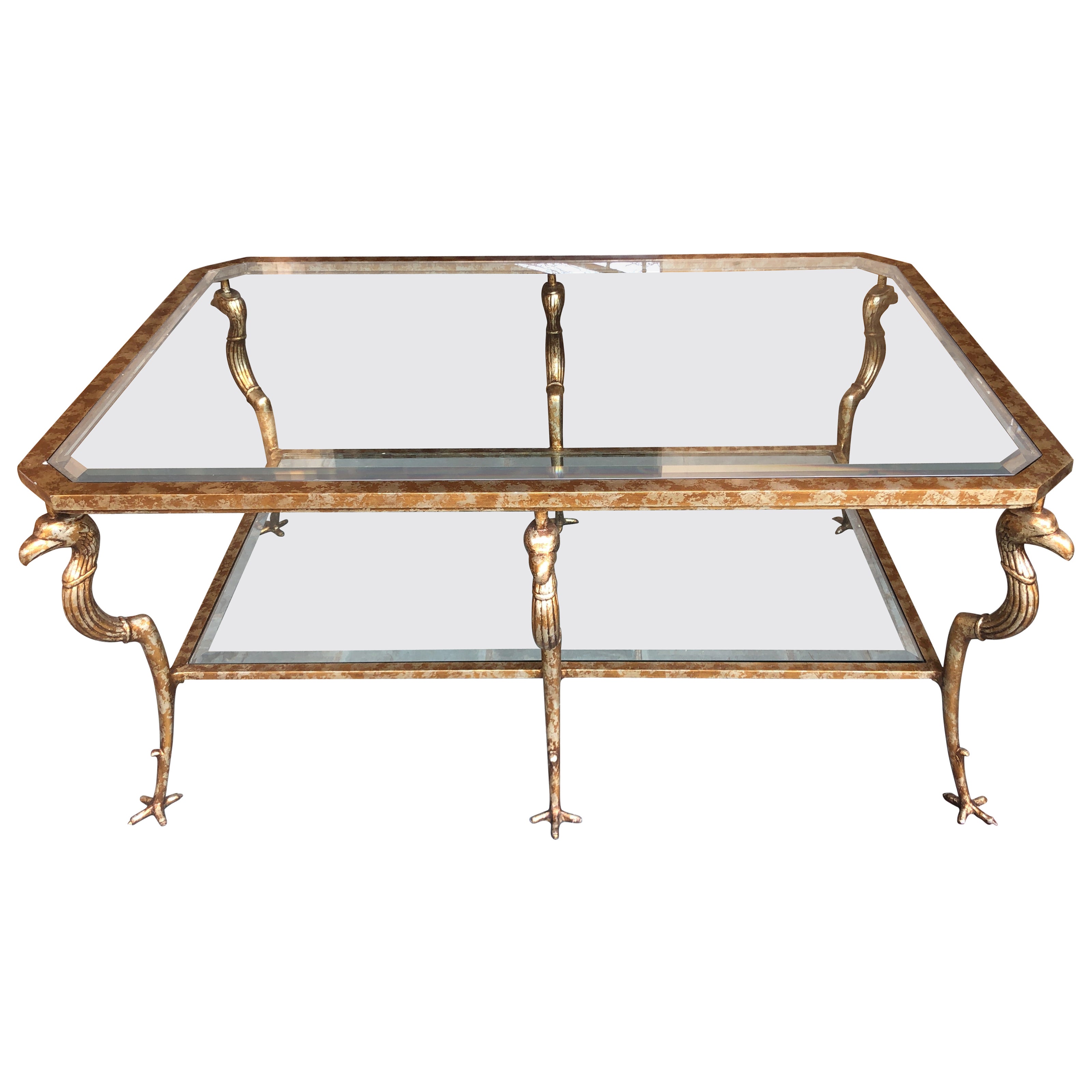 Magnificent Marge Carson Large Gold Griffon Leg Regency Glass Top Coffee Table For Sale