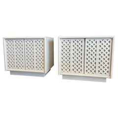 A pair that of Palm Beach Regency White Lacquered Honeycomb Cabinet nightstands
