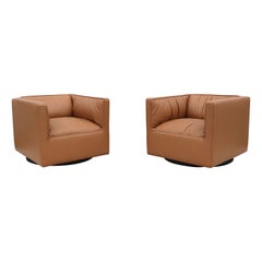 The Moderns Toan Nguyen for Studio TK Infinito Leather Swivel Lounge Chairs - a Pair (en anglais)