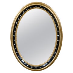 Irish Gilded and Ebonized 1920s Oval Mirror with Petite Glass Spheres