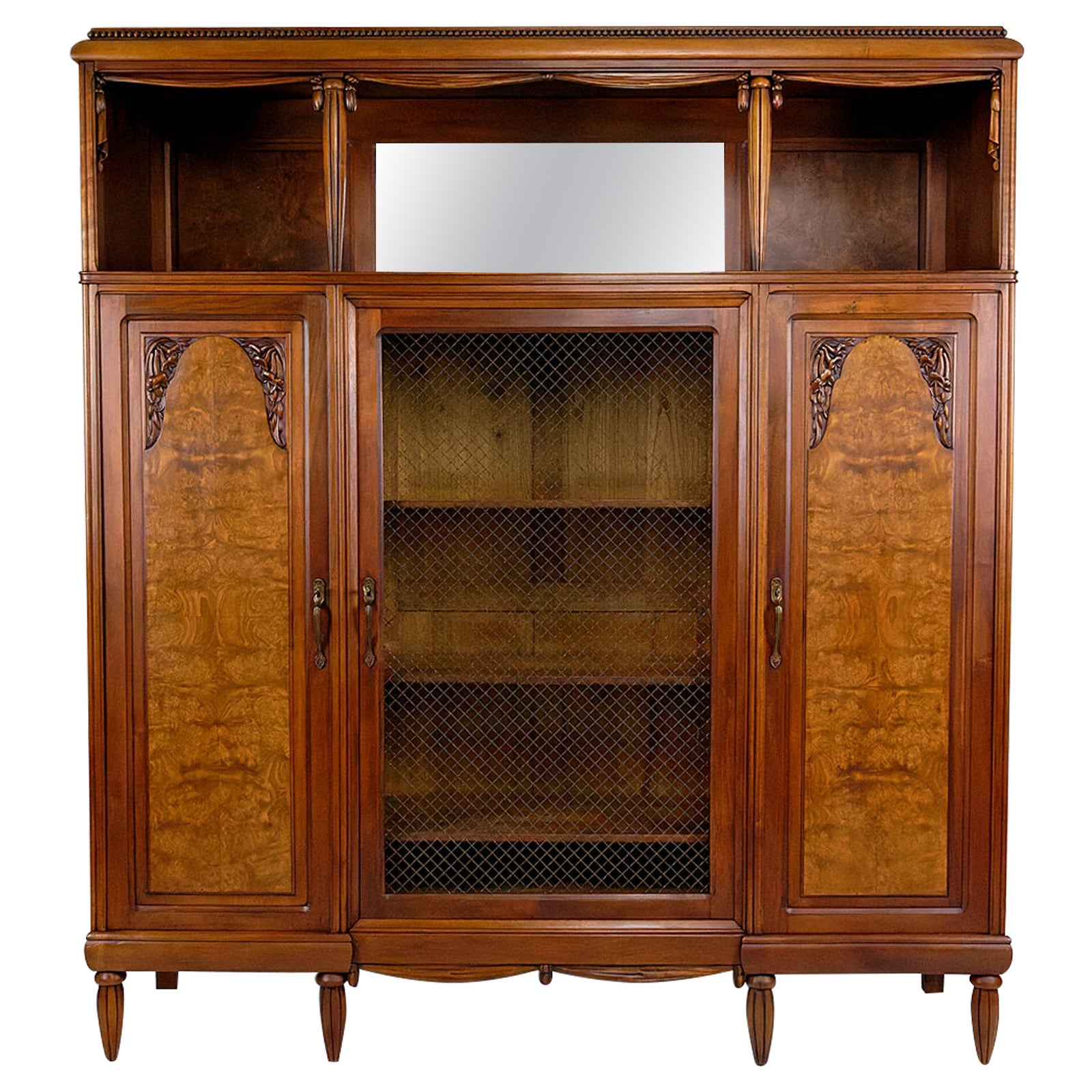 Art Deco bookcase / cabinet / display case in carved walnut, France, circa 1925 For Sale