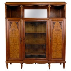 Art Deco bookcase / cabinet / display case in carved walnut, France, circa 1925