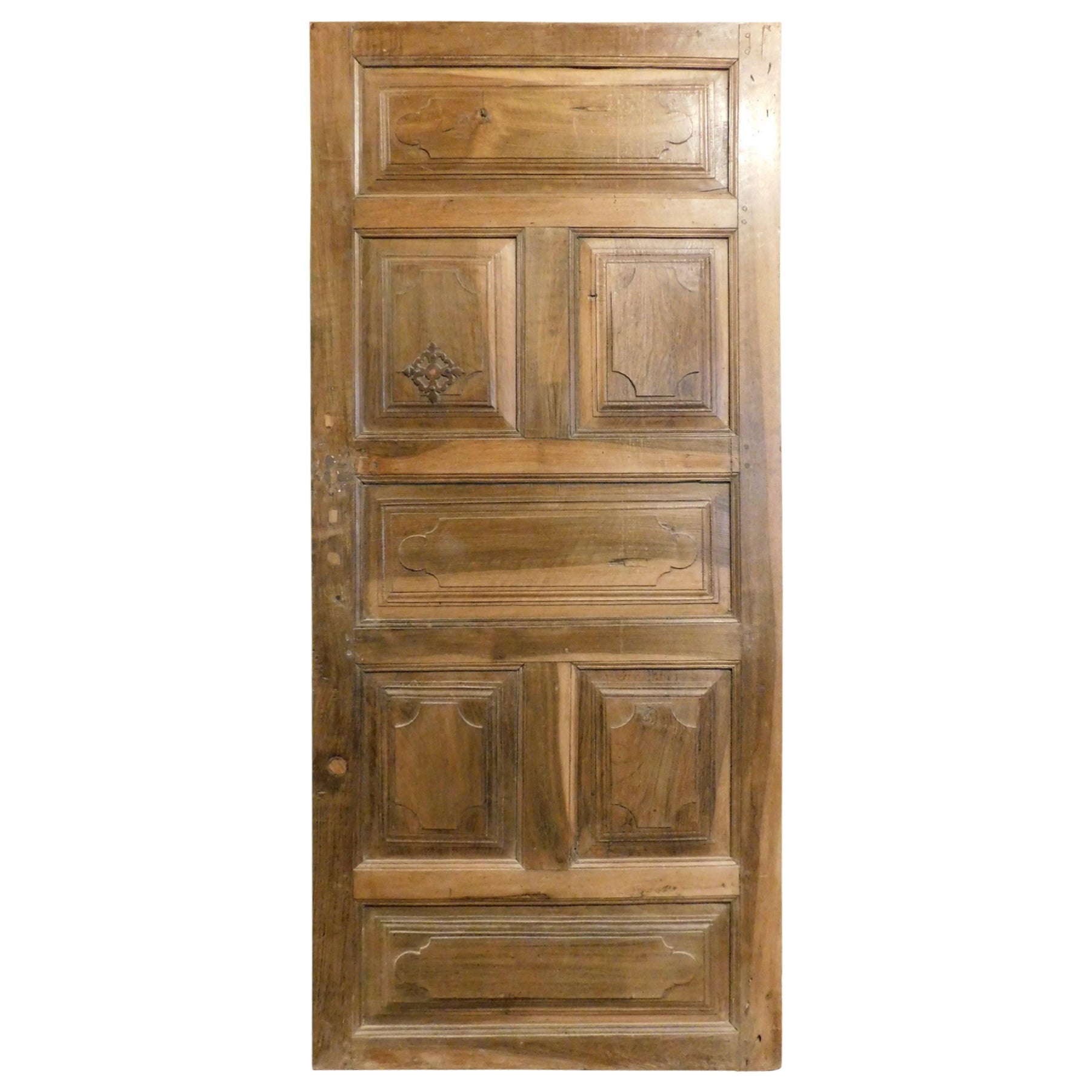 Carved single-leaf walnut door, Italy