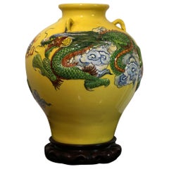 Antique Dragon in Flight through Clouds on Large Yellow Jar
