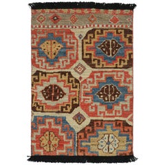 Rug & Kilim’s Tribal Style Rug with Primitivist Geometric Pattern and Medallions