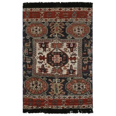 Rug & Kilim’s Tribal Style Rug with Primitivist Geometric Pattern and Medallions