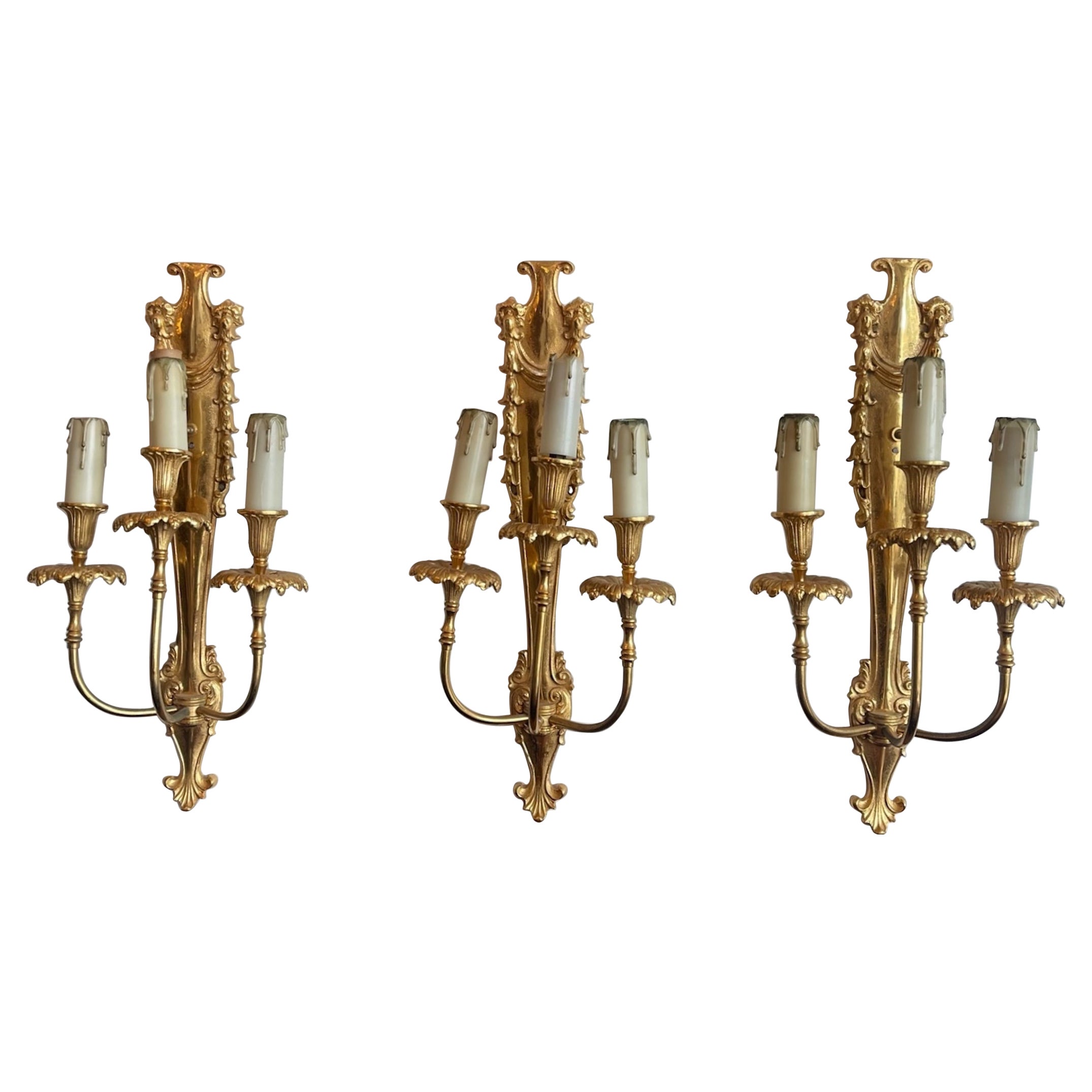 Three French 19th Century Louis XVI Style Gold Plated Bronze 3 Light Sconces
