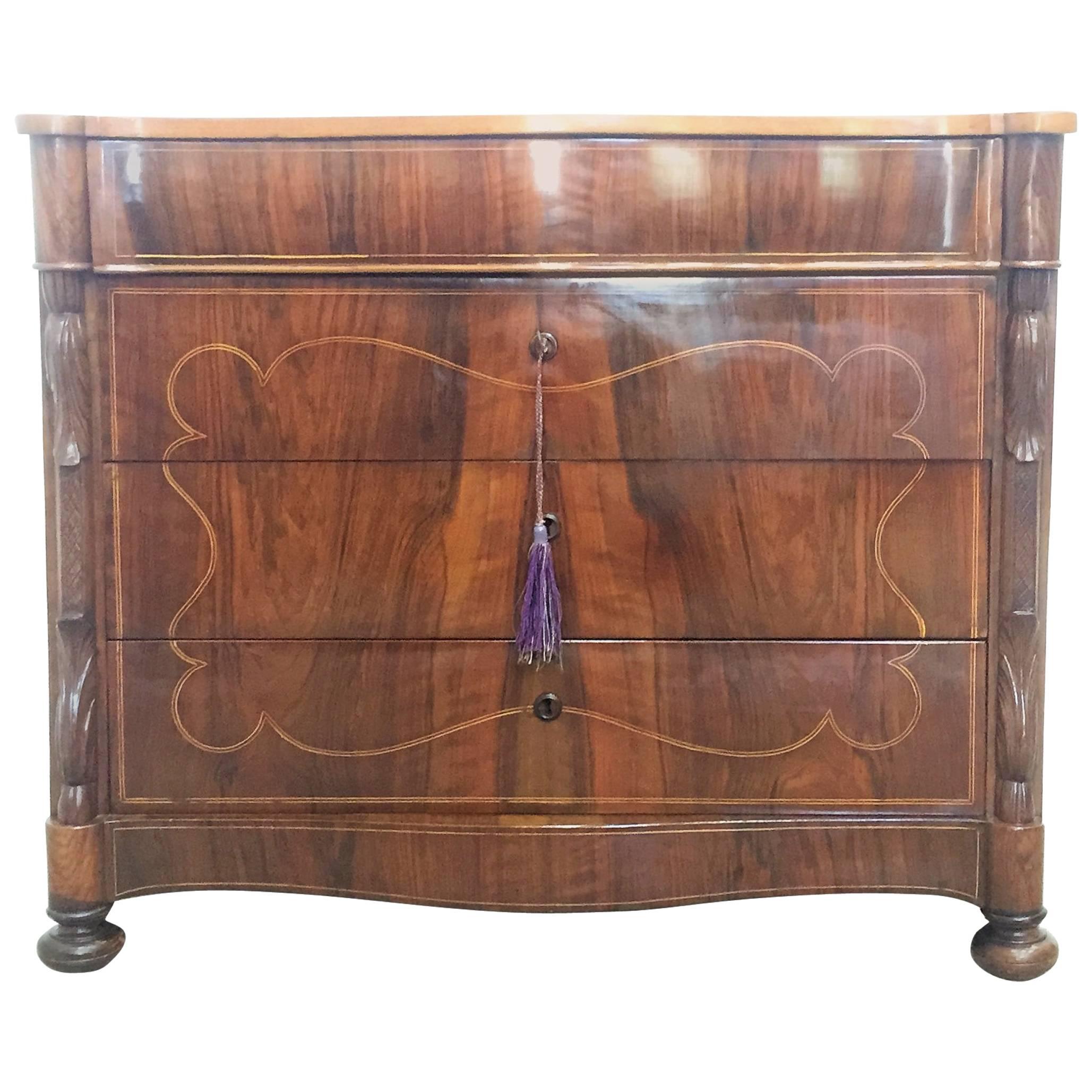 Chest of drawers. French Restauration Period Crotch Walnut Commode
