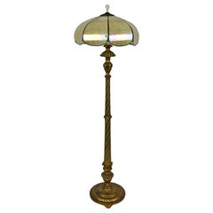 Antique Floor lamp in gilded carved wood and pearly glass lampshade, Art Deco, 1920's