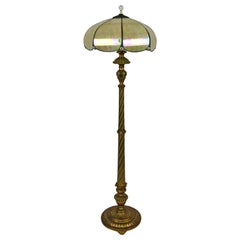 Floor lamp in gilded carved wood and pearly glass lampshade, Art Deco, 1920's