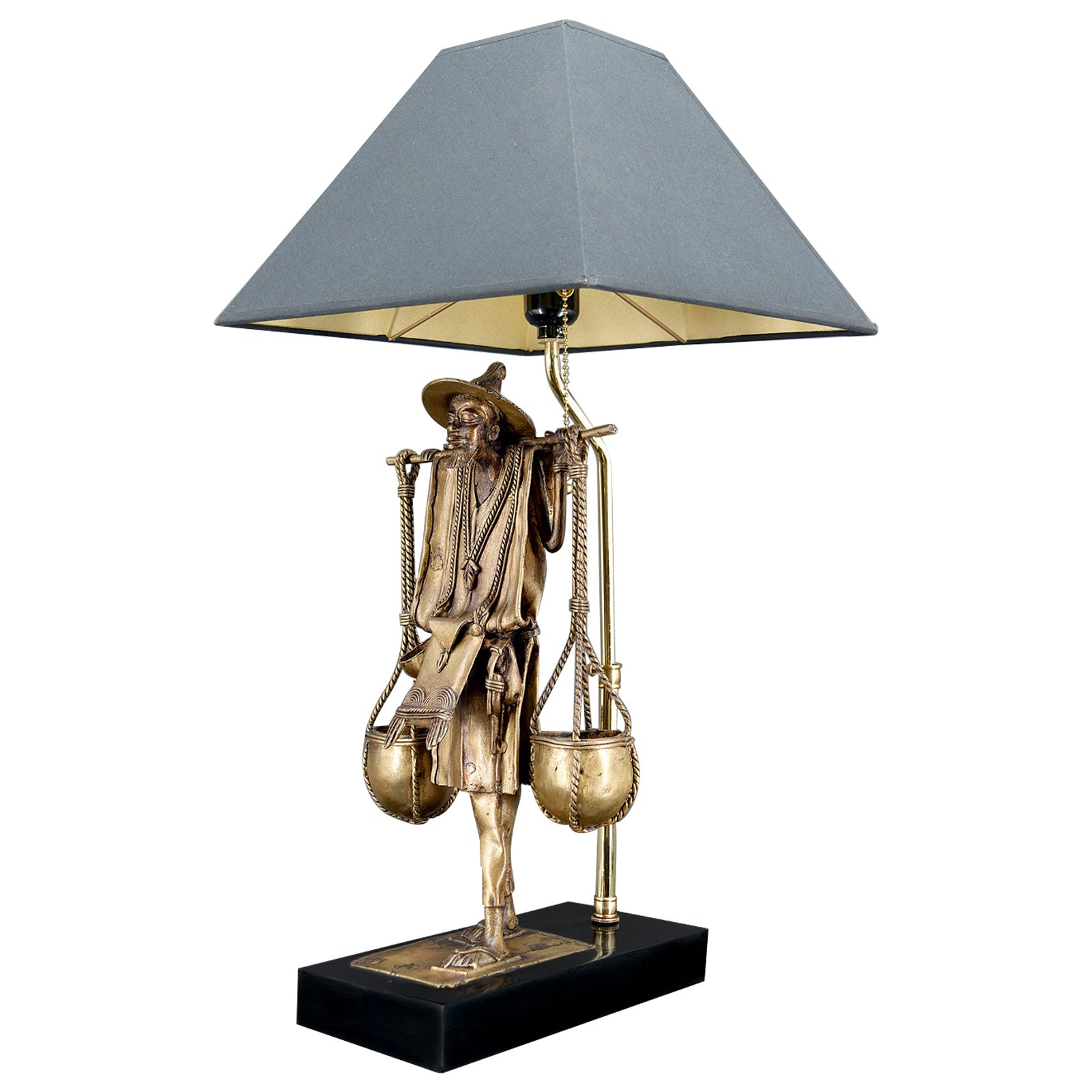 Bronze lamp, "Le Porteur Peul", France, in the style of Maison Charles, 1970's For Sale