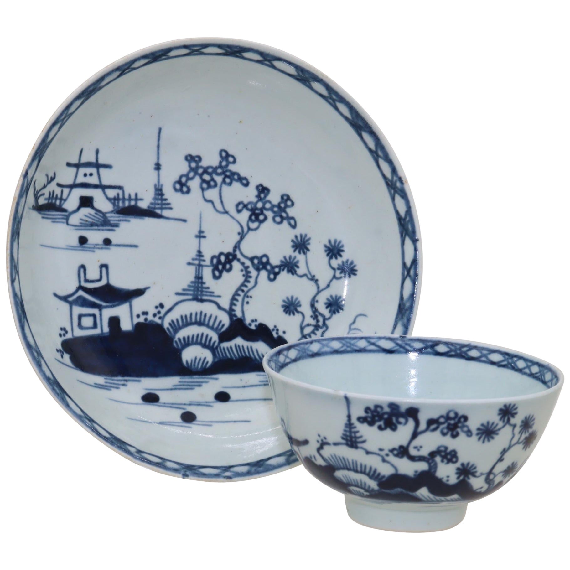 Liverpool porcelain hand painted tea bowl and saucer For Sale