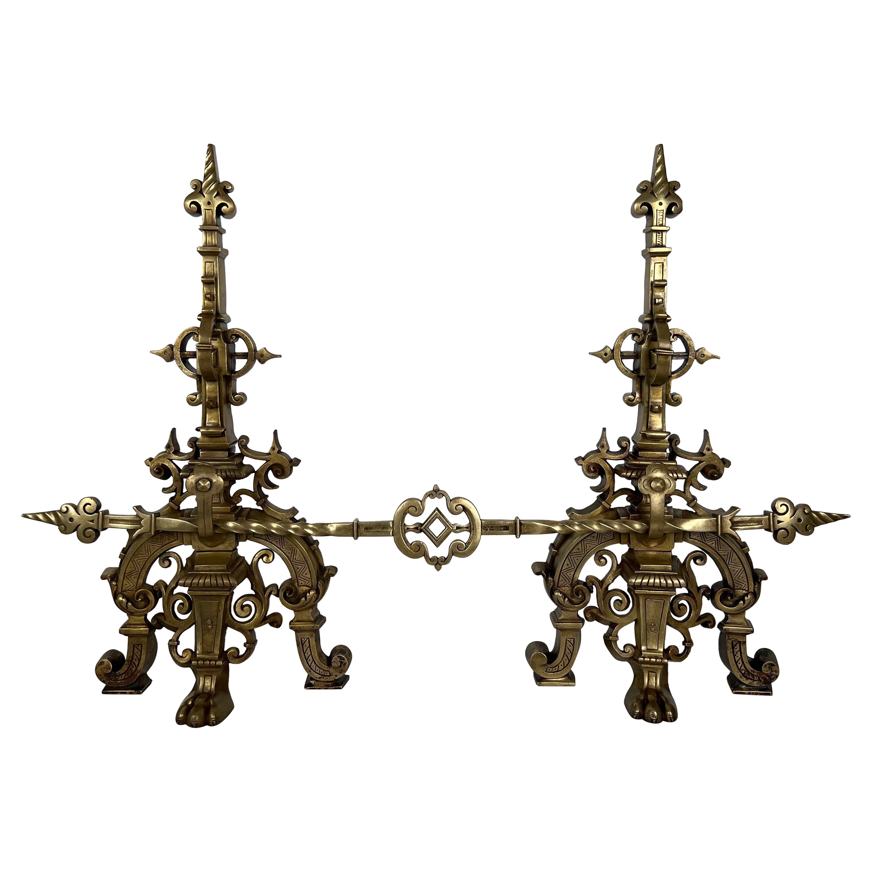 Important Bronze Fireplace Adornment Made of a Pair of Andirons and a Bronze Bar For Sale