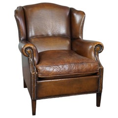 Used In good condition wingback chair made of sheepskin