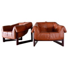 Paire de chaises longues MP93 de Percival Lafer en bois de rose et cuir d'origine