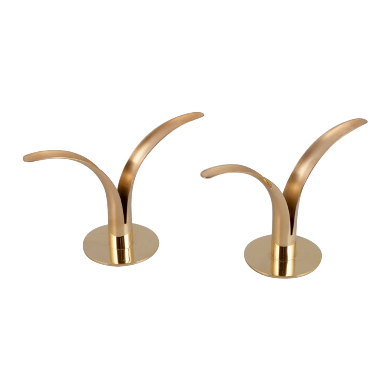 Skultuna, pair of "Liljan" (Lilly) candle holders in brass. 21st C For Sale