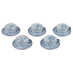 Rörstrand, Sweden. Set of five "Ostindia" coffee cups and saucers in faience. 