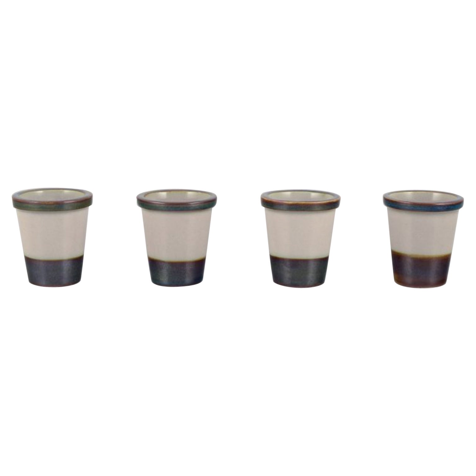 Bing & Grøndahl, "Tema". Four egg cups in stoneware. 1970s.