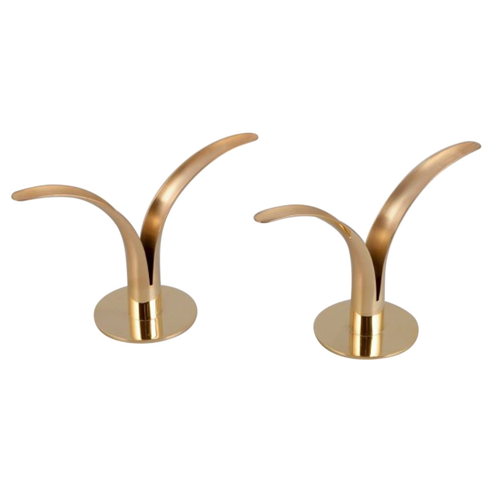 Skultuna, Sweden. Pair of "Liljan" candle holders in brass. 21st C For Sale