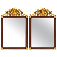 Paire de miroirs italiens néo-classiques du 19ème siècle en acajou et bois doré