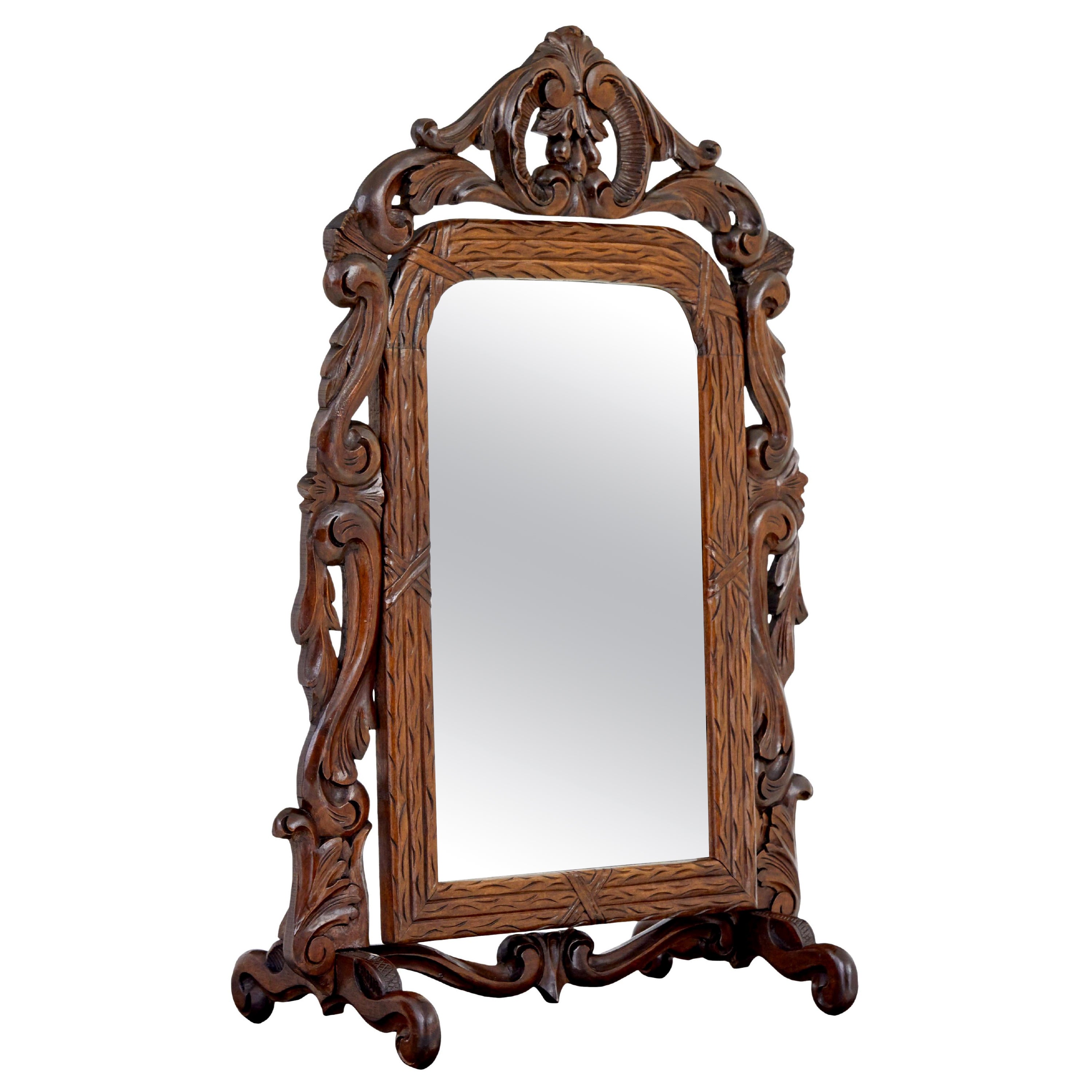 Late 19th century carved oak rococo revival vanity mirror For Sale