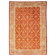 Alfombra turca de lana oushak roja hecha a mano con motivos florales de la década de 1880