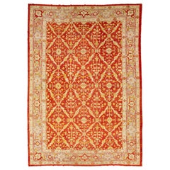 Handmade Red Turkish Oushak Wool Rug Featuring a Floral Pattern From The 1880's