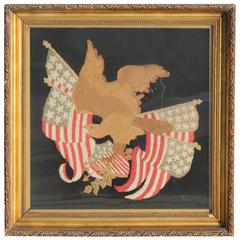 Mid-19th century embroidered eagle with original frame.