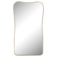 Vintage Mid-Century Modernist Brass Wrapped Mirror with Tapered and Rounded Detailing