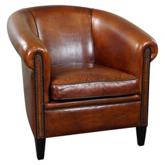 Beautiful sheep leather club armchair, superbly finished and in good condition