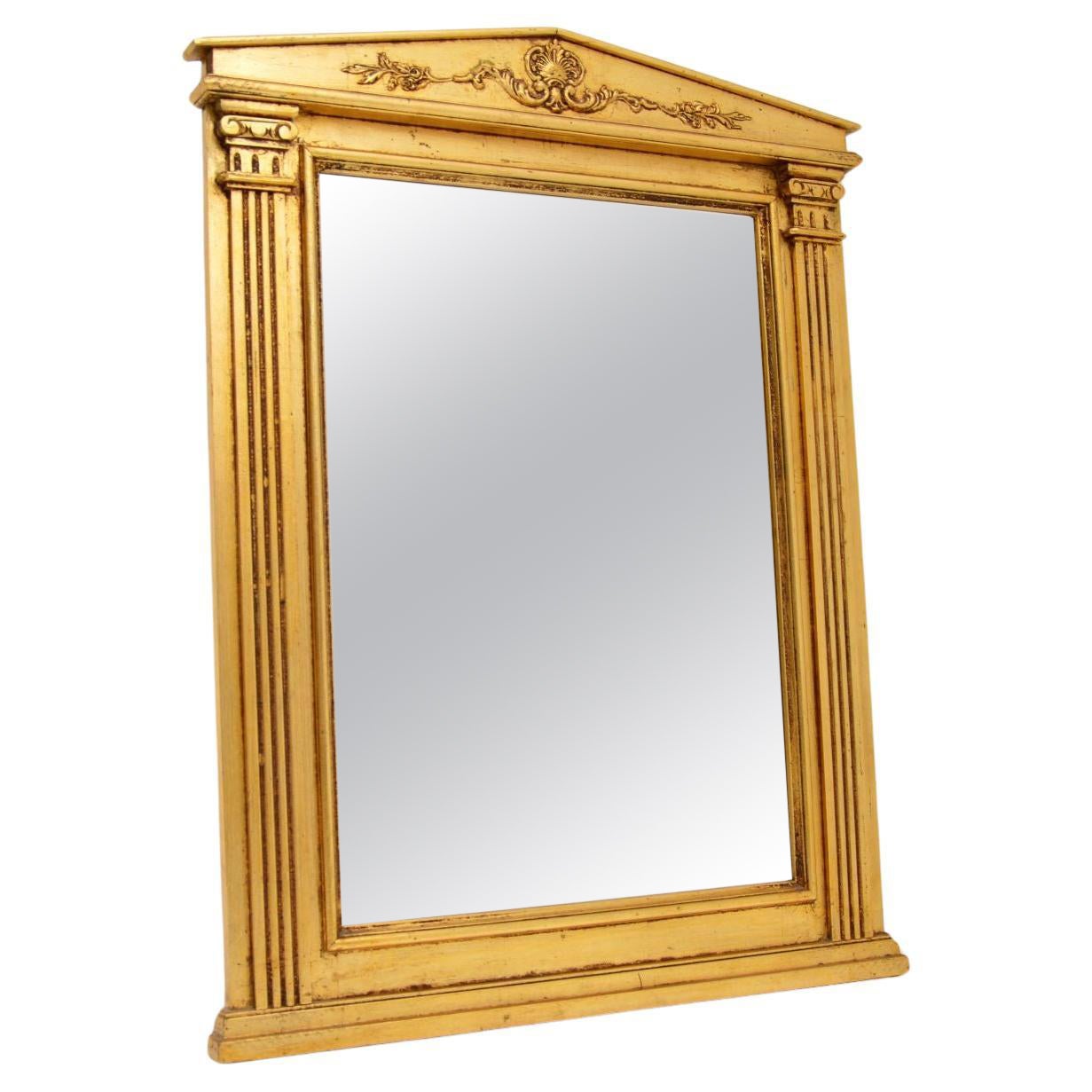 Miroir italien ancien néoclassique en bois doré en vente