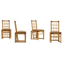 Retro Set of 4 Rattan dining chairs, 1970s Italy.