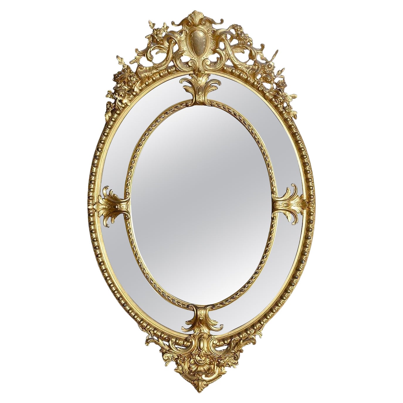 19th Century French Oval gilded wall mirror.
