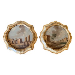 Paire d'huiles sur toile italiennes encadrées Capriccio représentant un paysage avec des ruines