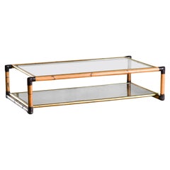 Bamboo coffee table with leather bindings and glass shelves by Fabrizio Smania