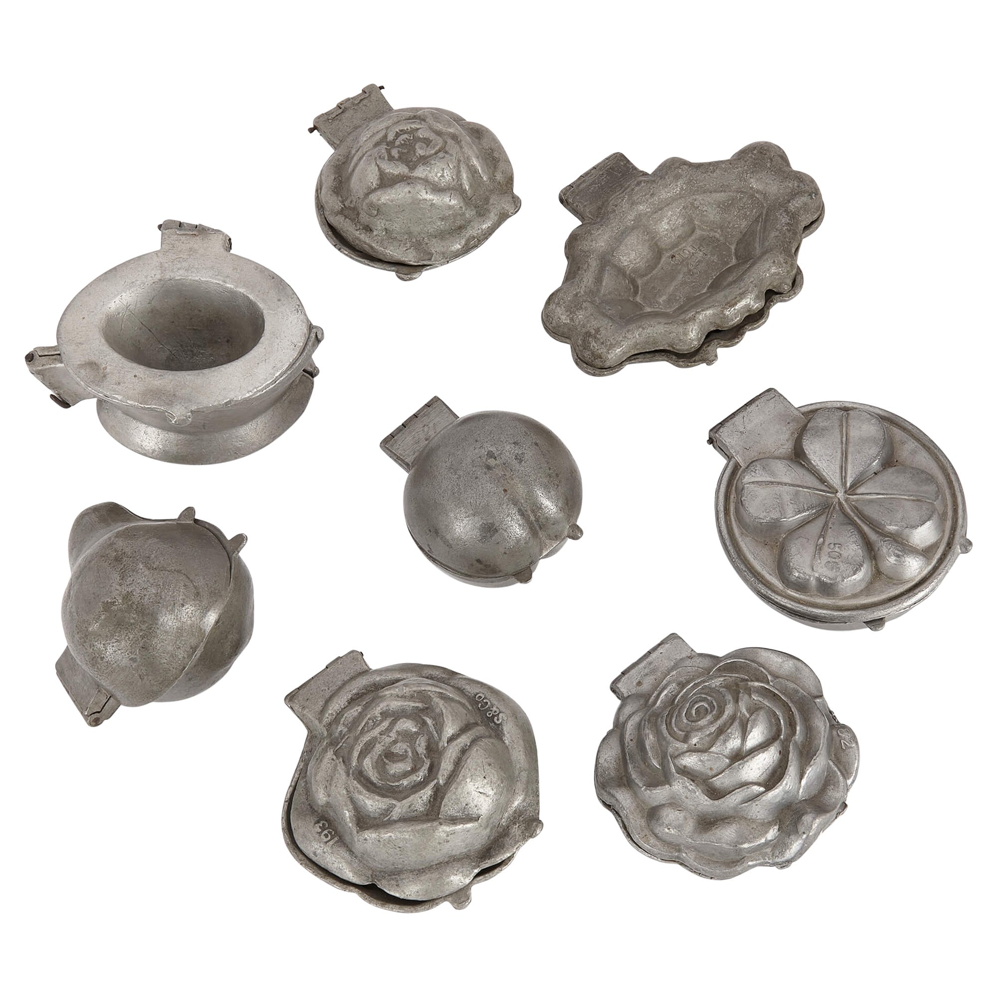 Collection of Eight American Pewter Ice Cream Moulds  For Sale