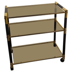 Tommaso Barbi's trolley in wood and brass