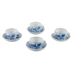 Vintage Meissen, Germany. Four Blue Onion coffee cups with saucers in porcelain.