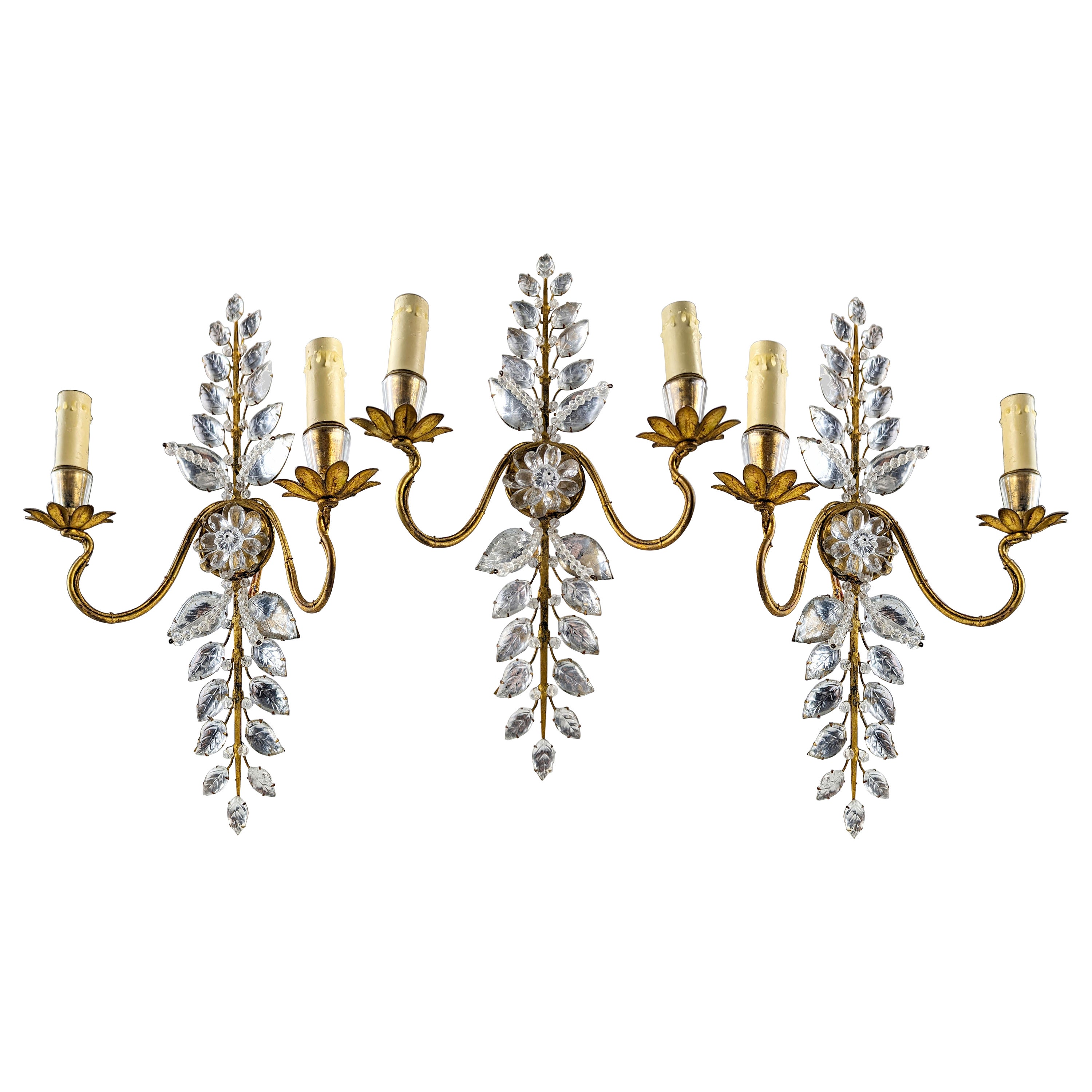 Set of three floral sconces by Maison Bagues in crystal and gold metal For Sale