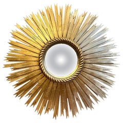 Grand miroir convexe sculpté et doré Sunburst 