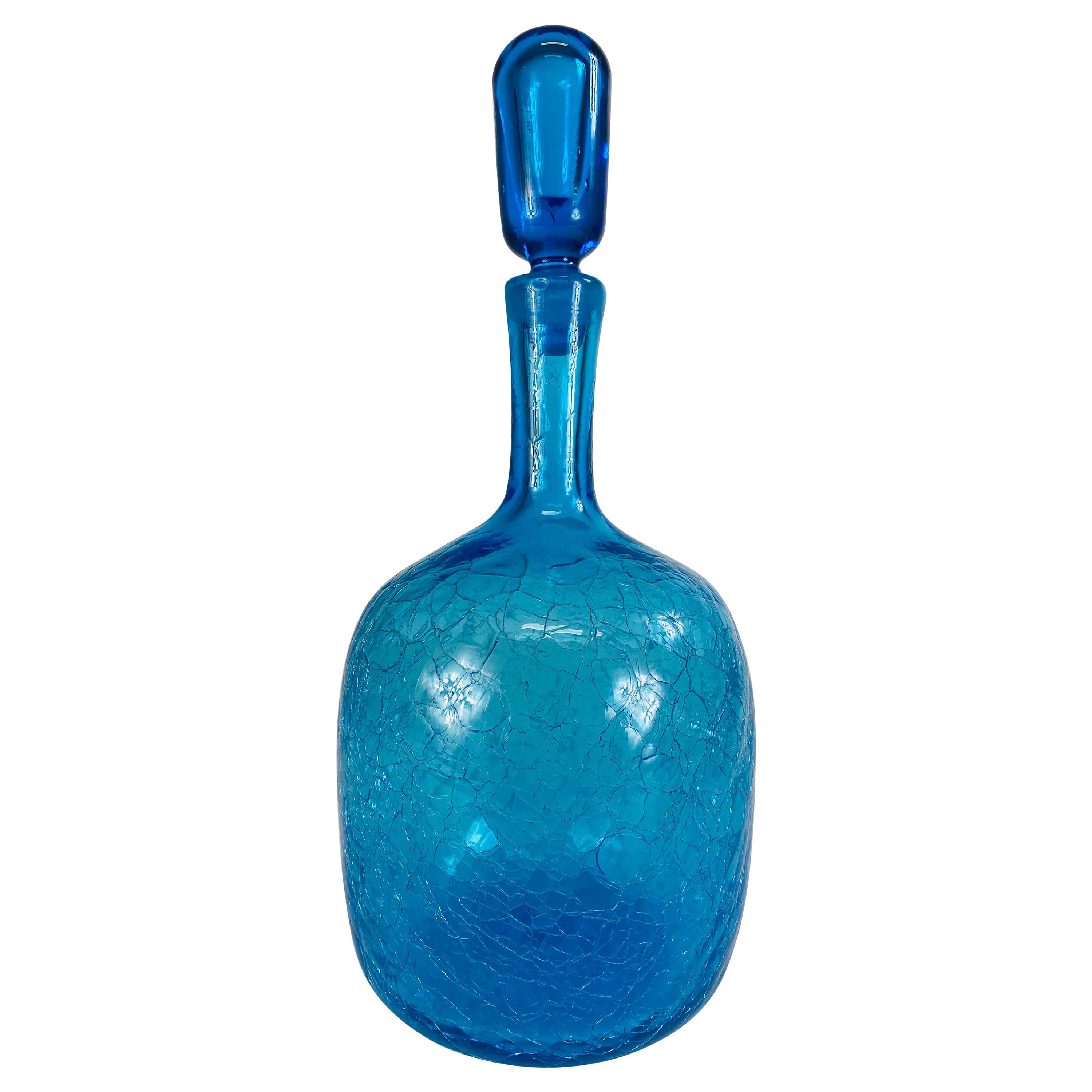 Jarre en verre bleu de Blenko avec bouchon, datant du milieu du siècle dernier.